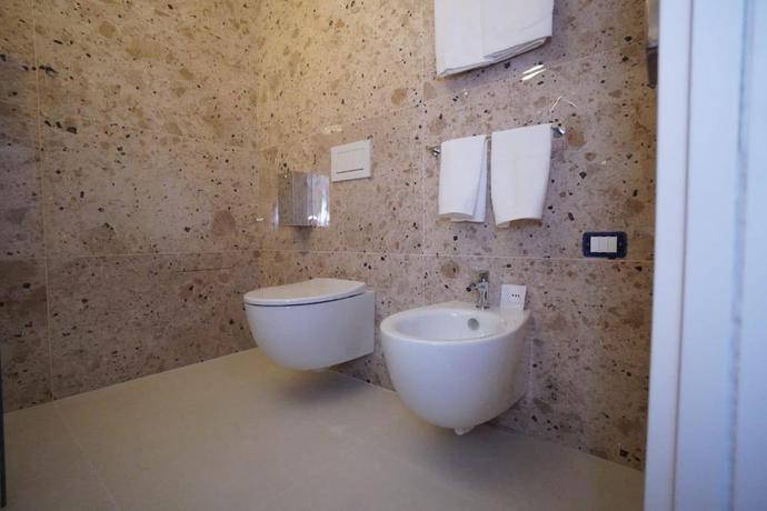 Imagen de la habitación del Hotel UNA La Martella Matera. Foto 7