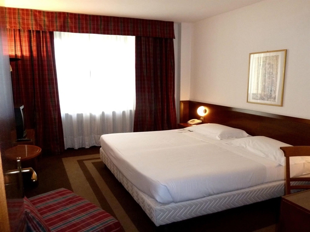 Imagen de la habitación del Hotel UNA Lodi. Foto 7