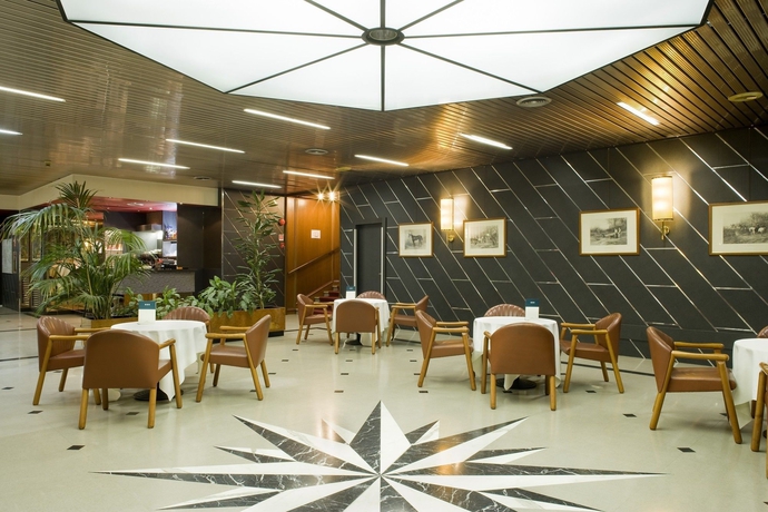 Imagen del bar/restaurante del Hotel UNA Lodi. Foto 4