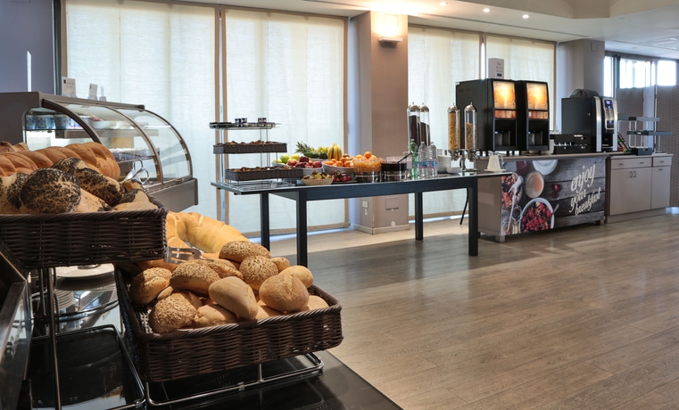 Imagen del bar/restaurante del Hotel UNAWAY & ResidenceAta Contessa Jolanda. Foto 6