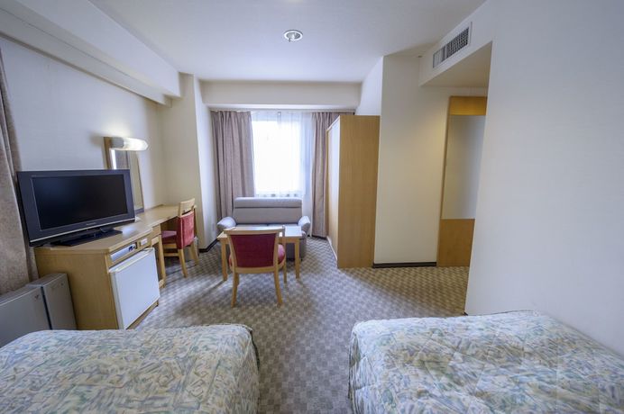 Imagen de la habitación del Hotel UNIZO INN Tokyo Asakusa. Foto 3