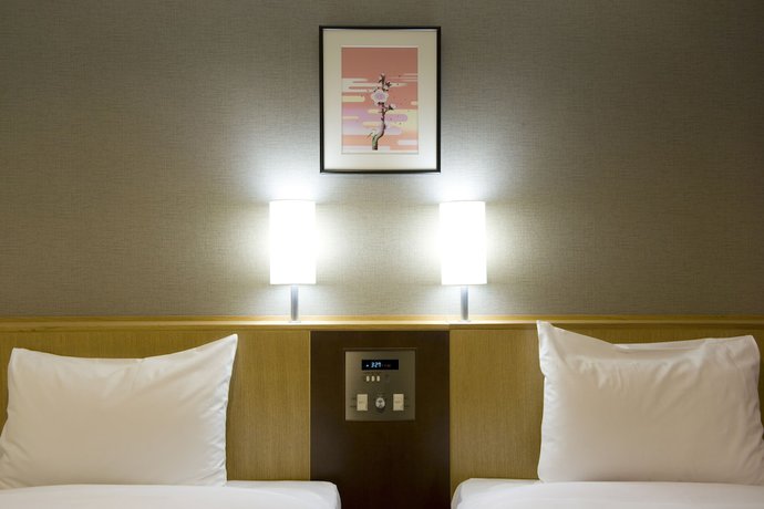 Imagen de la habitación del Hotel UNIZO INN Tokyo Asakusa. Foto 5