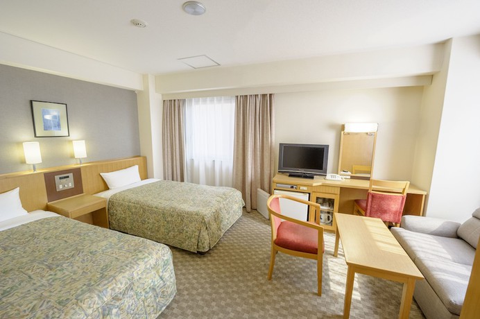 Imagen de la habitación del Hotel UNIZO INN Tokyo Asakusa. Foto 8