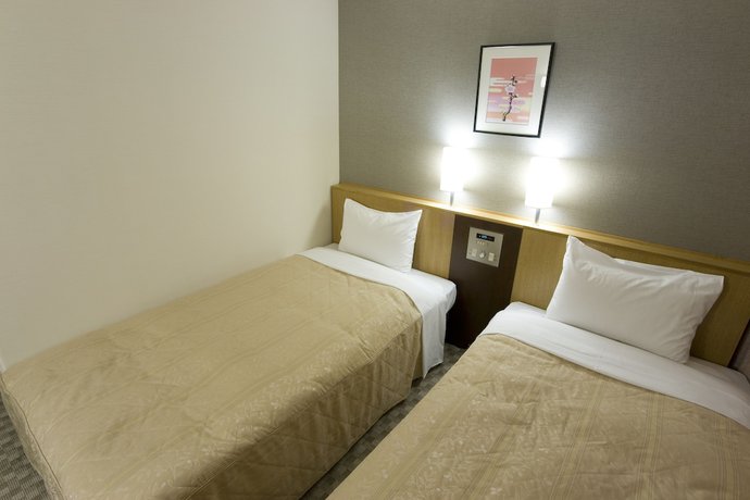 Imagen de la habitación del Hotel UNIZO INN Tokyo Asakusa. Foto 10