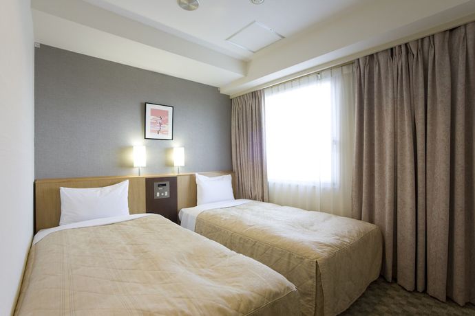 Imagen de la habitación del Hotel UNIZO INN Tokyo Asakusa. Foto 14