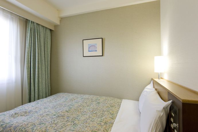 Imagen de la habitación del Hotel UNIZO INN Tokyo Asakusa. Foto 16