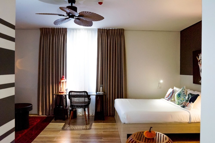 Imagen de la habitación del Hotel UNWND Boutique Dumaguete. Foto 5