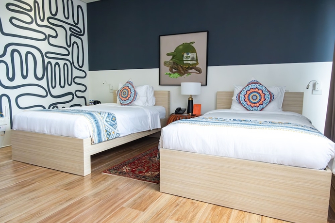 Imagen de la habitación del Hotel UNWND Boutique Dumaguete. Foto 6