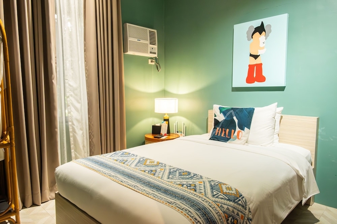 Imagen de la habitación del Hotel UNWND Boutique Dumaguete. Foto 9
