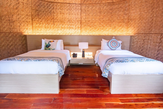 Imagen de la habitación del Hotel UNWND Boutique Dumaguete. Foto 12