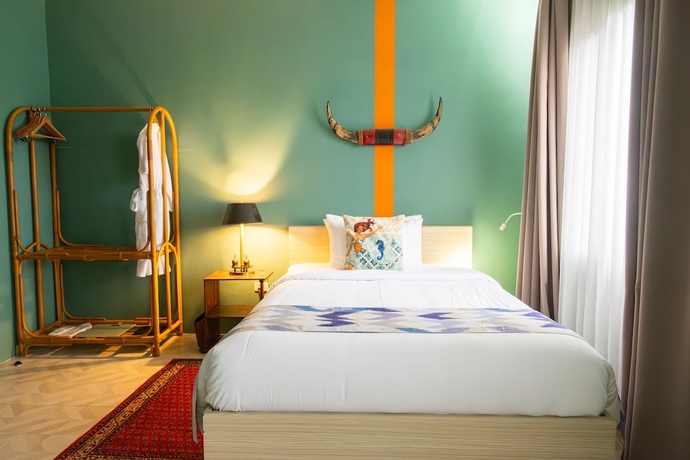 Imagen de la habitación del Hotel UNWND Boutique Dumaguete. Foto 14
