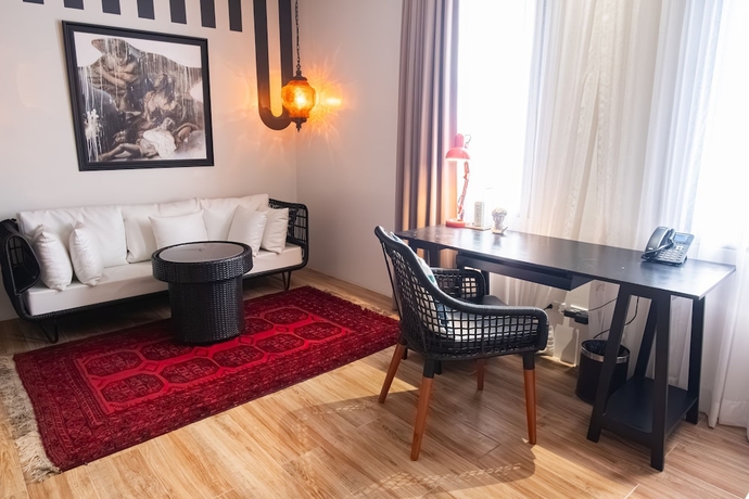 Imagen de la habitación del Hotel UNWND Boutique Dumaguete. Foto 16