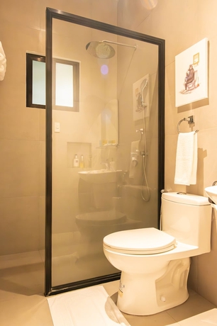 Imagen de la habitación del Hotel UNWND Boutique Dumaguete. Foto 17