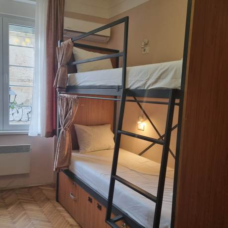 Imagen de la habitación del Hotel UP accommodation. Foto 2