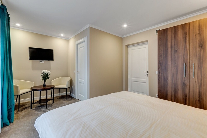 Imagen de la habitación del Hotel UPSTAIRS BOUTIQUE. Foto 9