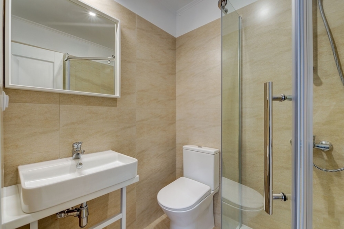 Imagen de la habitación del Hotel UPSTAIRS BOUTIQUE. Foto 16