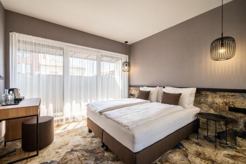 Imagen de la habitación del Hotel URBAN HOTEL, Debrecen. Foto 16