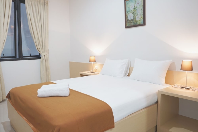 Imagen de la habitación del Hotel UROOMS Panglima Polim. Foto 4