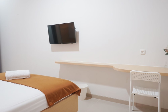 Imagen de la habitación del Hotel UROOMS Panglima Polim. Foto 10