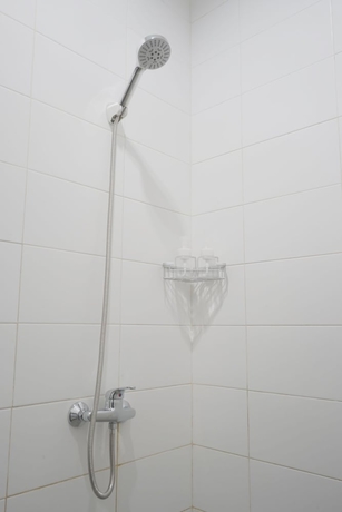 Imagen de la habitación del Hotel UROOMS Panglima Polim. Foto 12