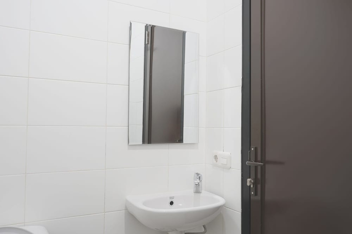 Imagen de la habitación del Hotel UROOMS Panglima Polim. Foto 16