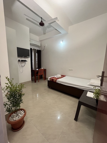 Imagen de la habitación del Hotel USC Homestay. Foto 16