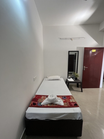 Imagen de la habitación del Hotel USC Homestay. Foto 18