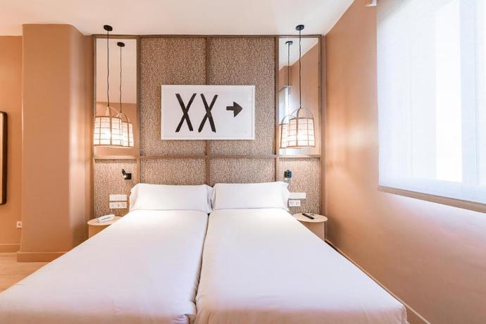 Imagen de la habitación del Hotel U-Sense Granada Centro. Foto 10