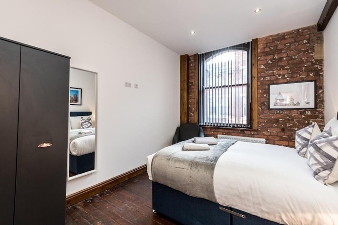 Imagen de la habitación del Hotel UStay 27 Stanley Street Party Apartments. Foto 8