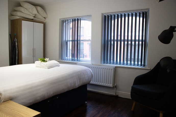 Imagen de la habitación del Hotel UStay 27 Stanley Street Party Apartments. Foto 13