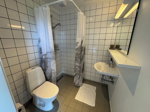 Imagen de la habitación del Hotel Ubberup Konferencegaard. Foto 15