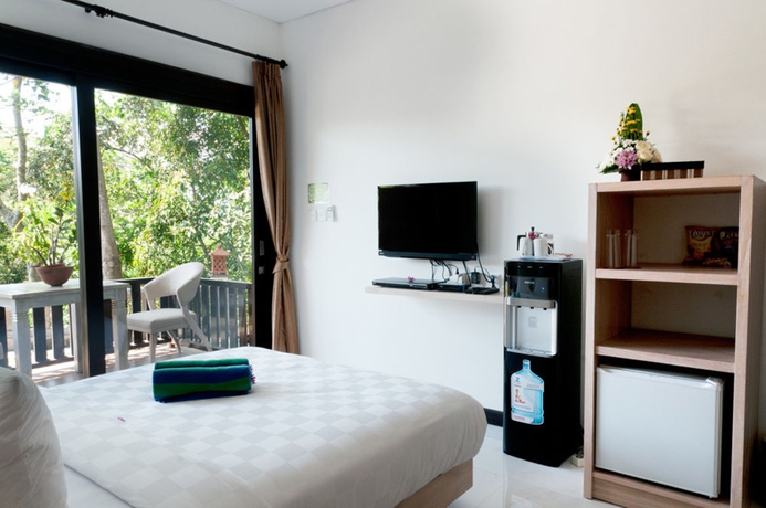 Imagen de la habitación del Hotel Ubud Dedari Villas. Foto 10