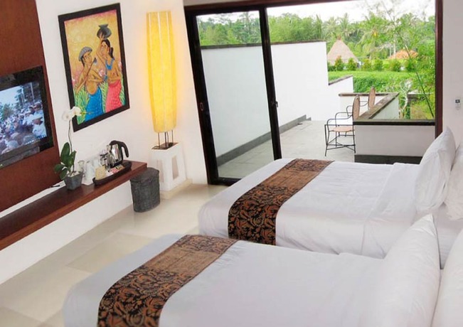 Imagen de la habitación del Hotel Ubud Green Resort Villas Powered by Archipelago. Foto 6