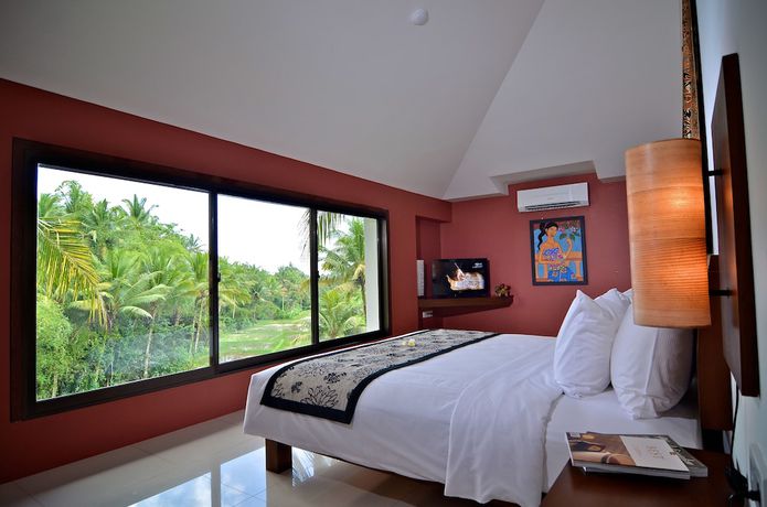 Imagen de la habitación del Hotel Ubud Green Resort Villas Powered by Archipelago. Foto 10