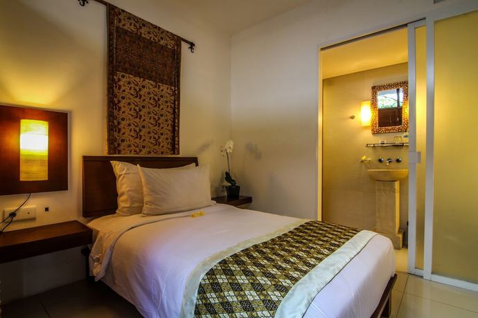 Imagen de la habitación del Hotel Ubud Green Resort Villas Powered by Archipelago. Foto 11