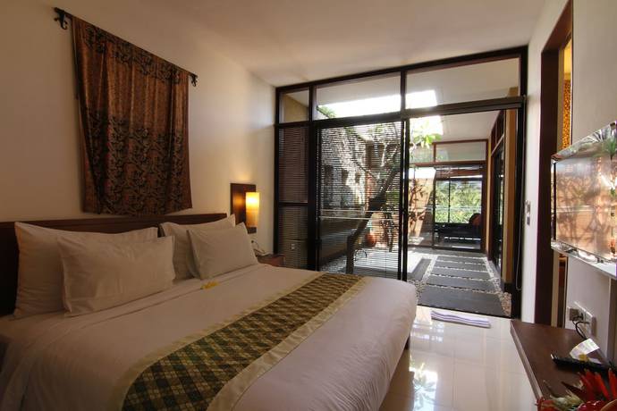 Imagen de la habitación del Hotel Ubud Green Resort Villas Powered by Archipelago. Foto 15