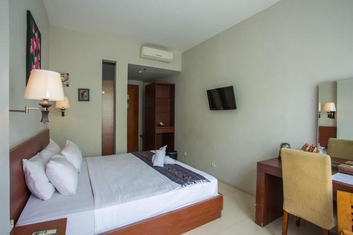 Imagen de la habitación del Hotel Ubud Hotel and Cottages Malang. Foto 7