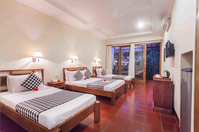 Imagen de la habitación del Hotel Ubud Inn Cottages. Foto 6