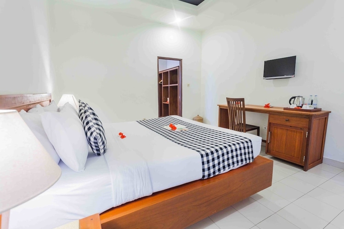 Imagen de la habitación del Hotel Ubud Inn Cottages. Foto 8