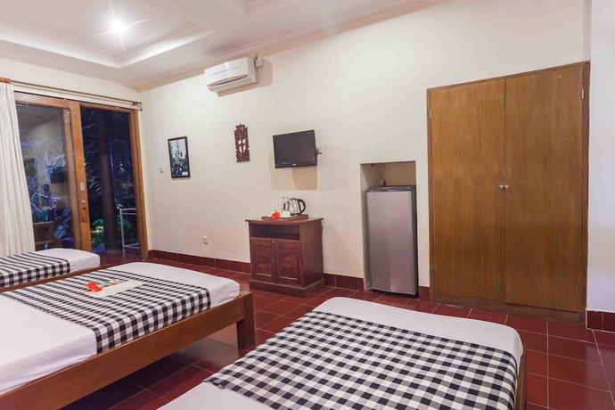 Imagen de la habitación del Hotel Ubud Inn Cottages. Foto 9