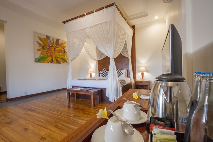 Imagen de la habitación del Hotel Ubud Inn Cottages. Foto 10