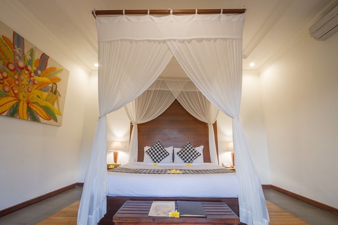 Imagen de la habitación del Hotel Ubud Inn Cottages. Foto 11