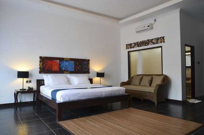 Imagen de la habitación del Hotel Ubud Raya. Foto 7