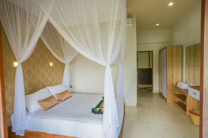 Imagen de la habitación del Hotel Ubud Sari Health Resort. Foto 12
