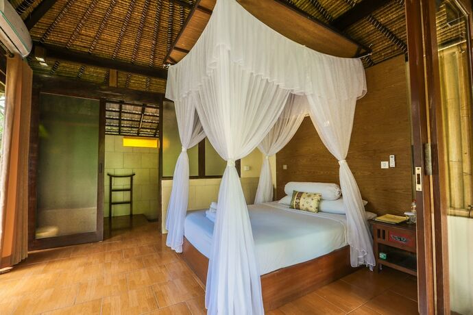 Imagen de la habitación del Hotel Ubud Sari Health Resort. Foto 14