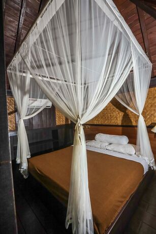 Imagen de la habitación del Hotel Ubud Sari Health Resort. Foto 19