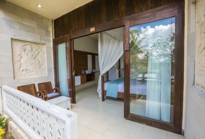Imagen de la habitación del Hotel Ubud Sari Health Resort. Foto 24