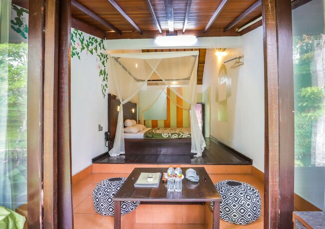 Imagen de la habitación del Hotel Ubud Sari Health Resort. Foto 26