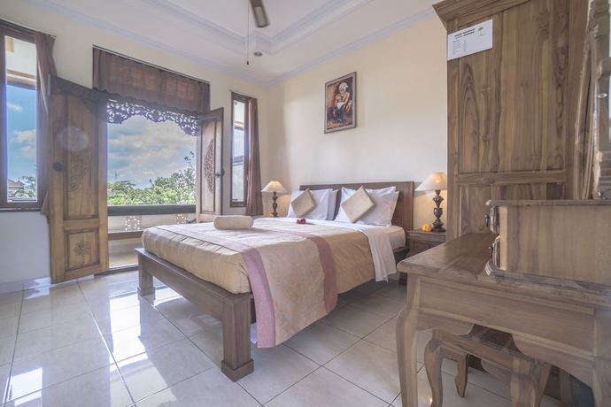Imagen de la habitación del Hotel Ubud Sensasi Bungalows. Foto 6