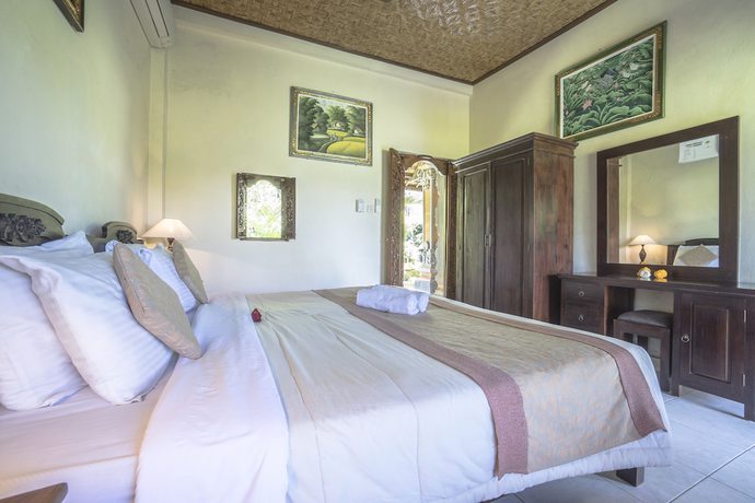 Imagen de la habitación del Hotel Ubud Sensasi Bungalows. Foto 9